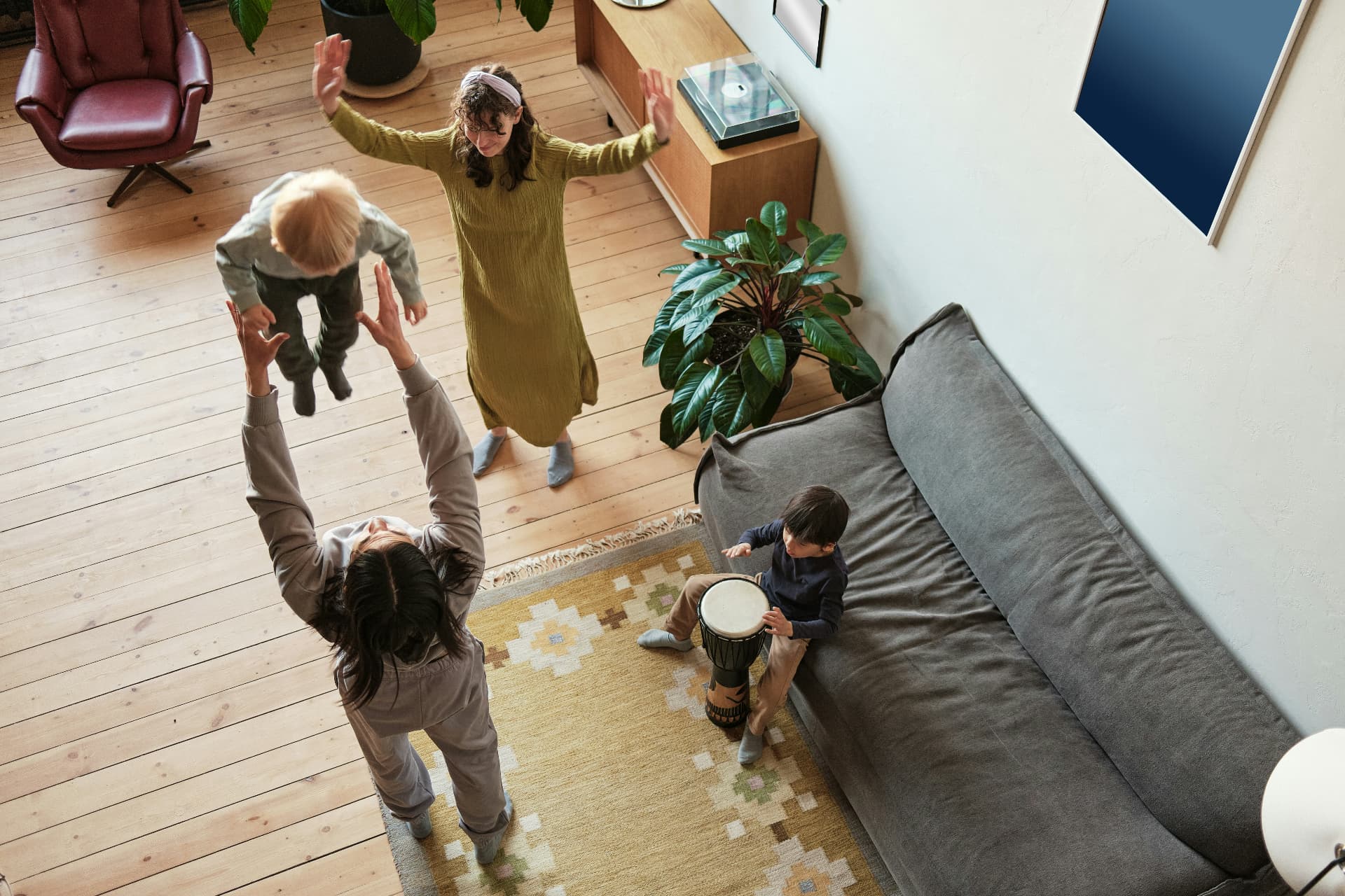Family spending time together in the living room of their home